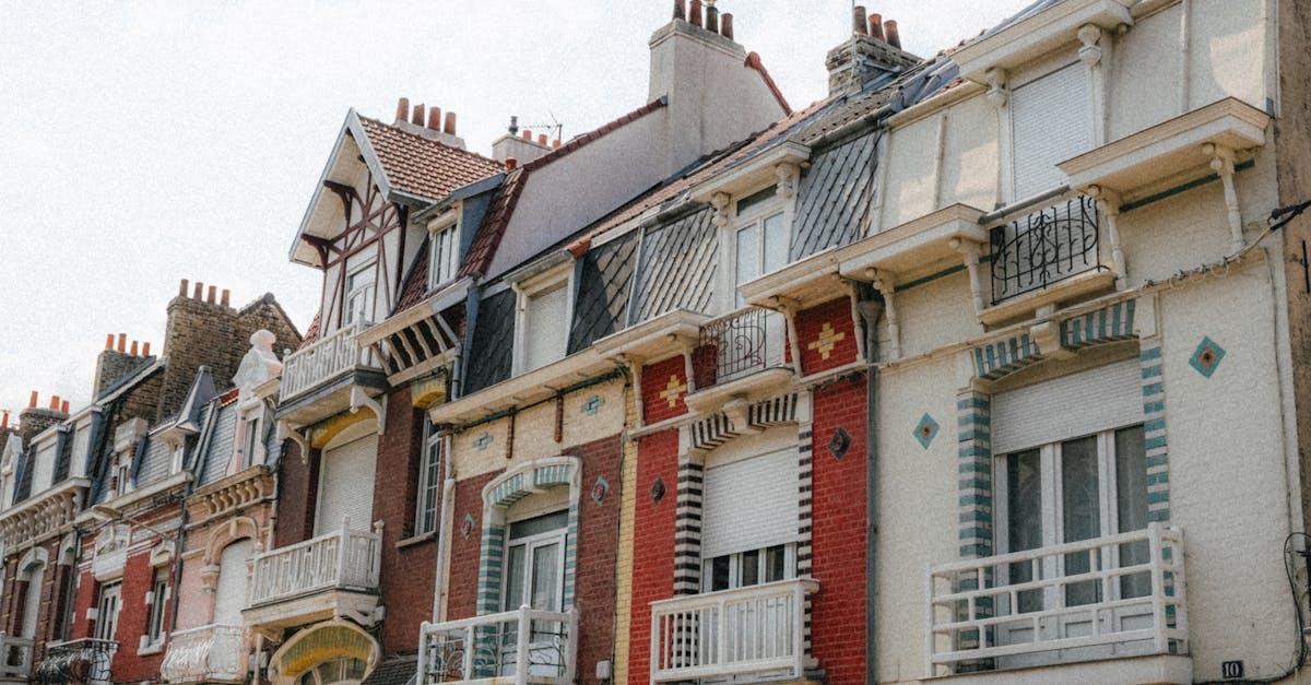 Colorful ornate facades of historic homes in Dunkerque, France, showcasing traditional architecture.